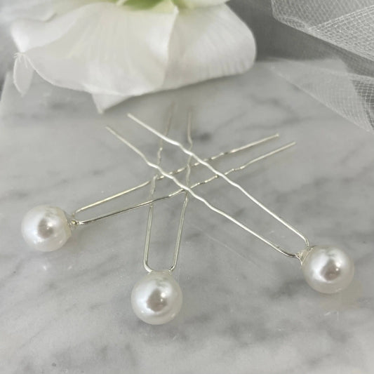 Bridal Pearl Hairpins: Elegant Accessories for Timeless Hairstyles.