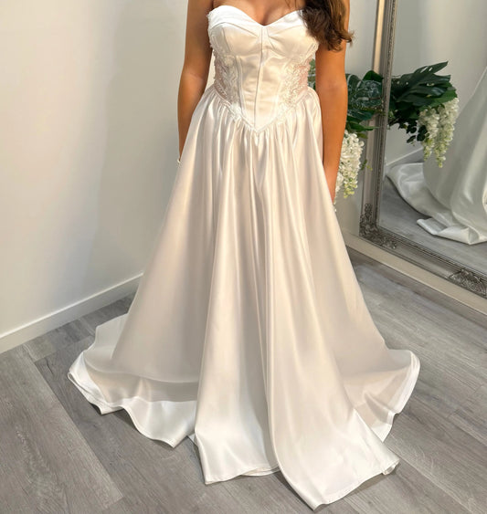 Front of the Cazzy debutante dress showing full bodice and tulle skirt