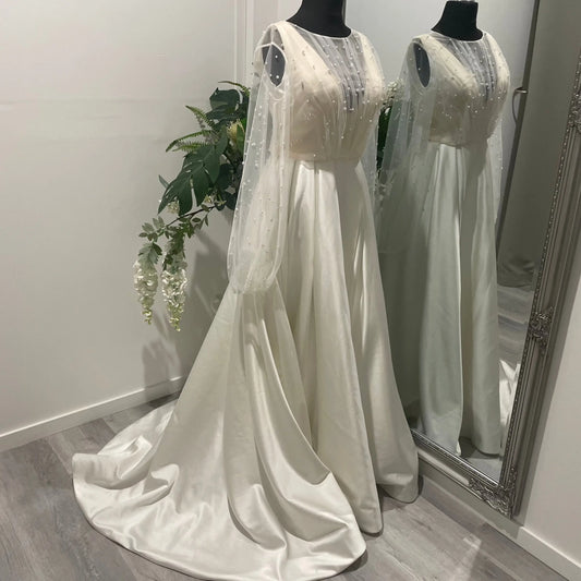 Darcy Pearl Wedding Bridal Topper with Elegant Draping and Puff Sleeves.