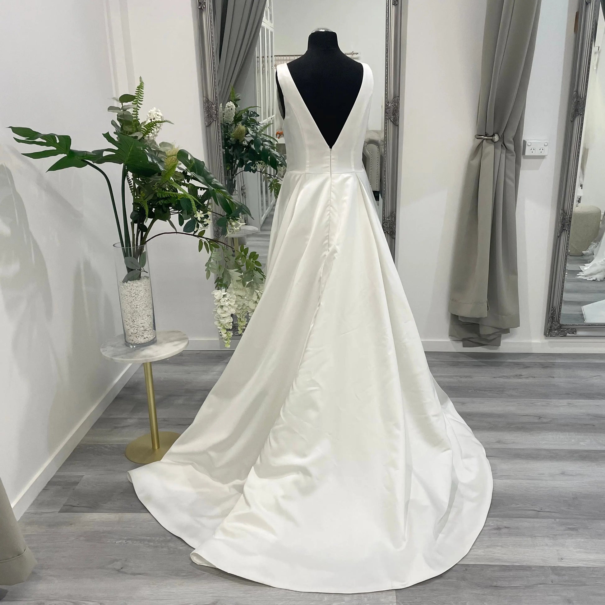 Back view of Darcy wedding gown with front split and fitted bodice