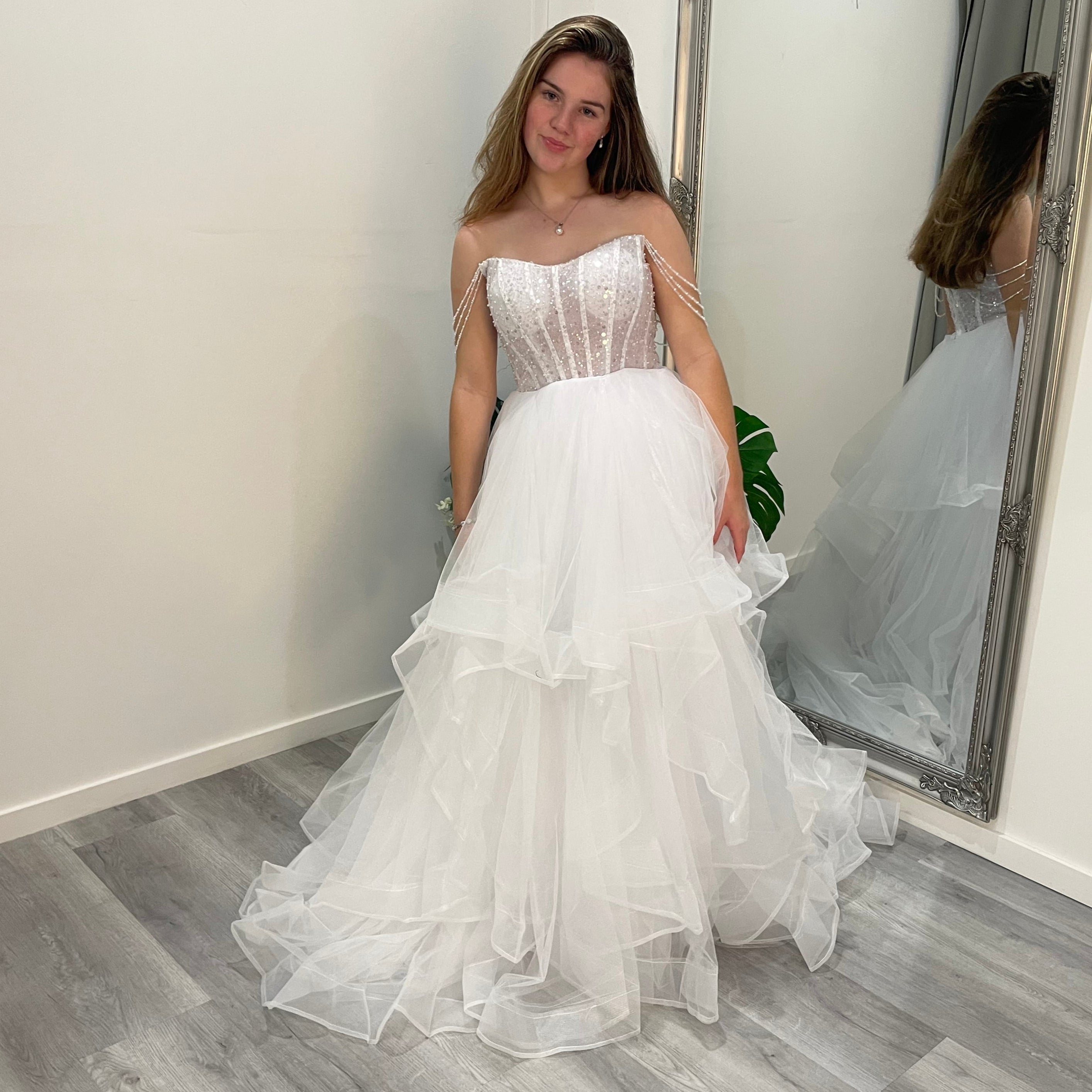 Front view of Elowen Debutante Dress with a sculpted scoop neckline, beaded corset bodice, and a soft, flowing A-line tulle skirt.