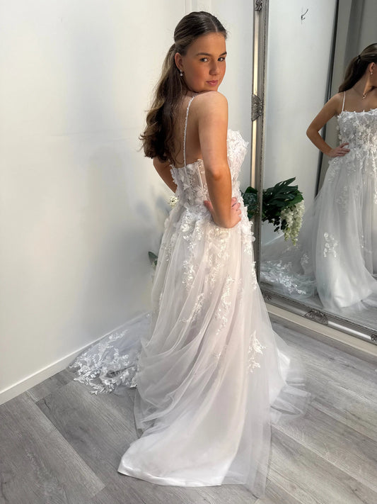 Side view of the Judy debutante dress highlighting the silhouette