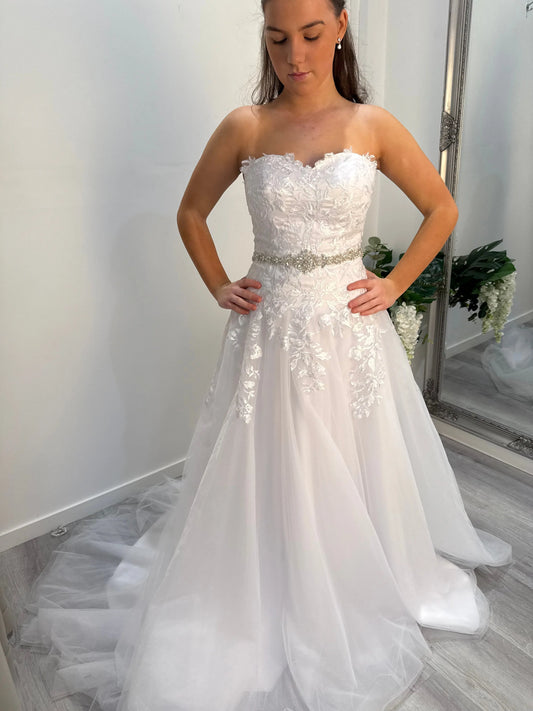 Close-up of the front of the Libby Debutante Dress with sweetheart neckline and lace detailing