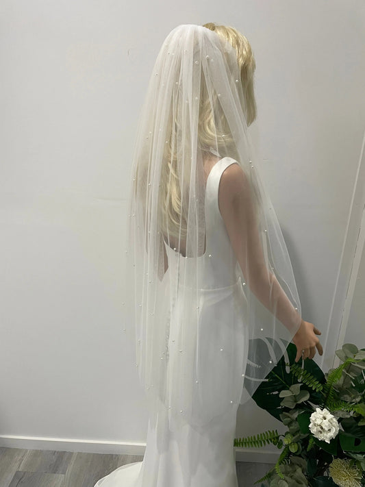 Side view of 1m veil showing pearl placement and natural drape