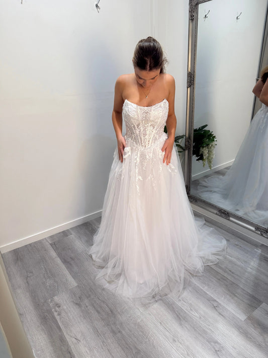 Front of the dress, model looking down