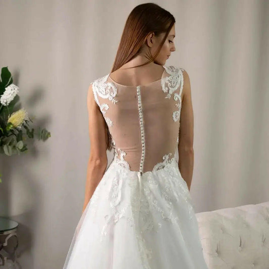 Lucia: V-neckline in Lace simple elegant wedding dress.