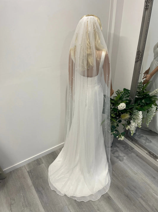 Back view of 2-meter pearl cathedral veil in soft tulle with silver-backed pearls