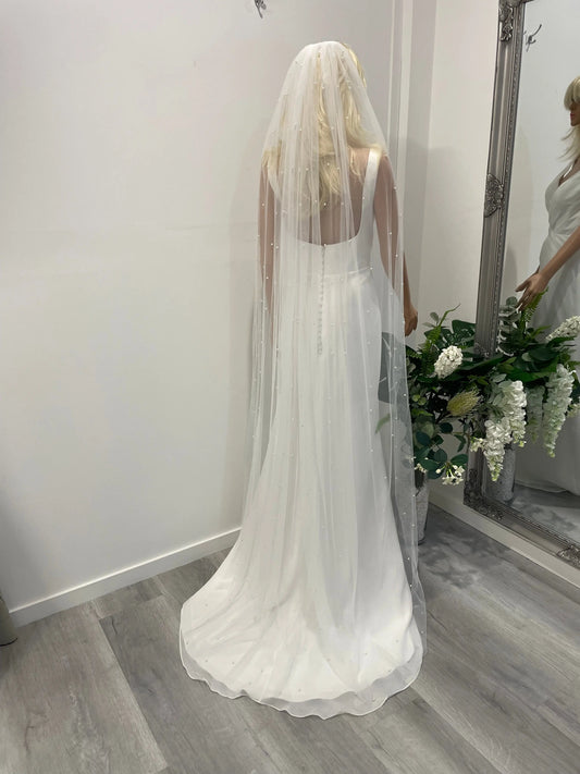 Back view of 2-meter pearl cathedral veil in soft tulle with silver-backed pearls
