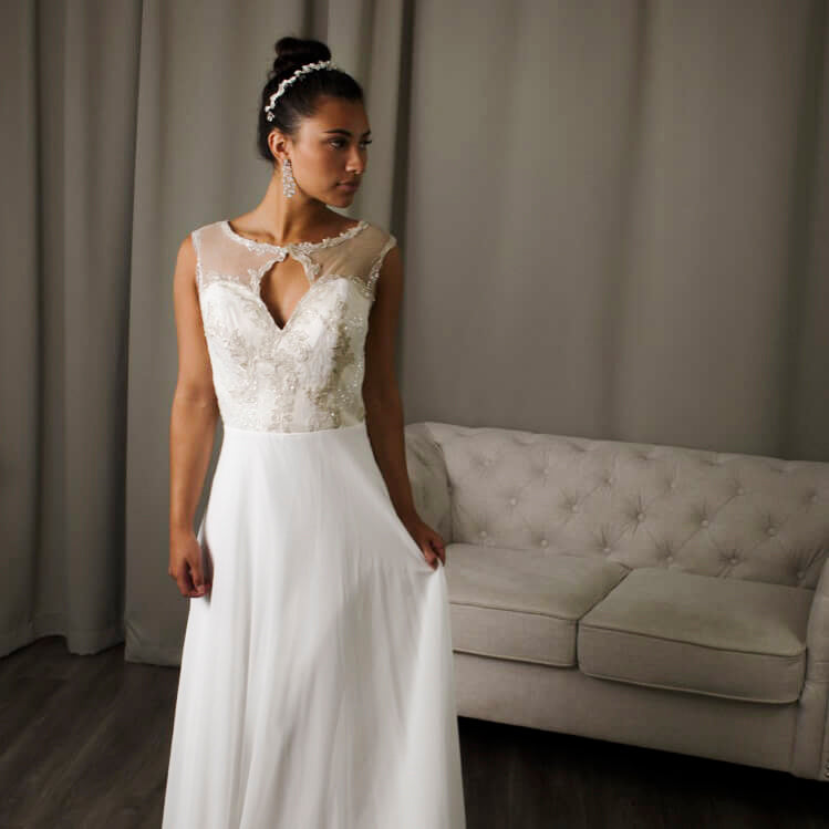Annette lace A-line wedding dress with keyhole illusion and sweetheart neckline.