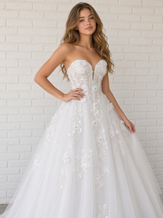 Alana V1 white 3D floral debutante dress, front view on model with raised flower corset and cascading lace tulle skirt