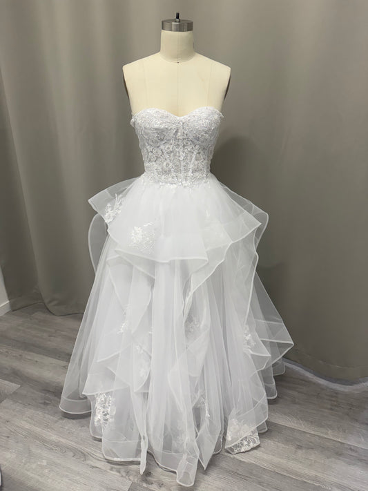 April Floral Lace Ruffled Strapless White Debutante Ball Gown on mannequin - intricate lace corset bodice and multi-layered ruffled tulle skirt