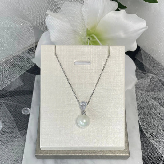 Brittany pearl necklace with drop pendant.