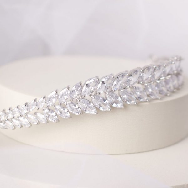 Magnificent Ella Bridal Headband adorned with dazzling cubic zirconia marquise crystals, crafted in elegant silver, perfect for enhancing any bridal ensemble with timeless elegance.