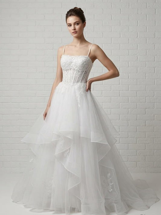 Elegant white strapless Mary lace debutante dress with structured bodice and layered tulle skirt.