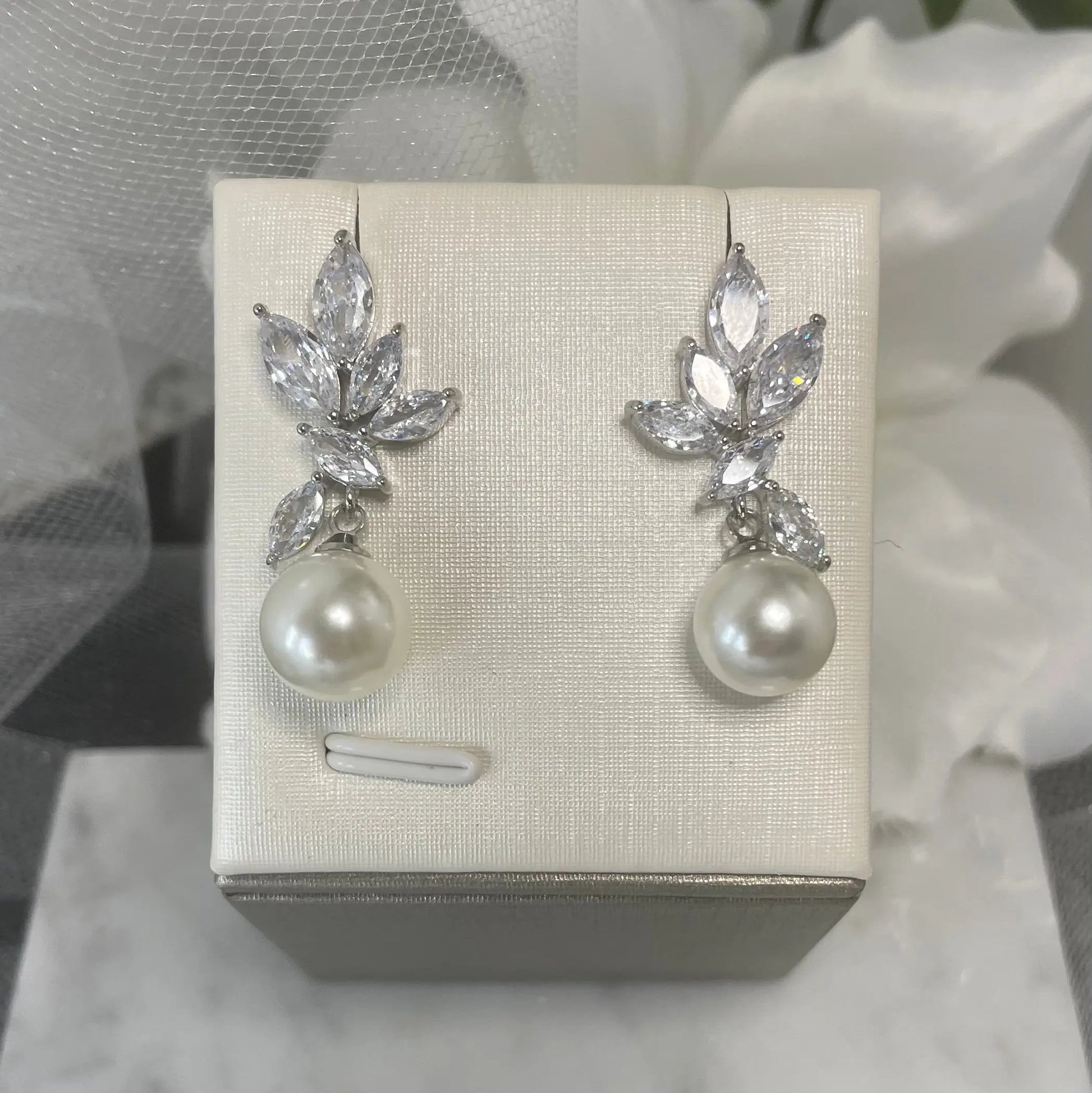 Celeste Pearl Earrings – Cascading Bridal Elegance.