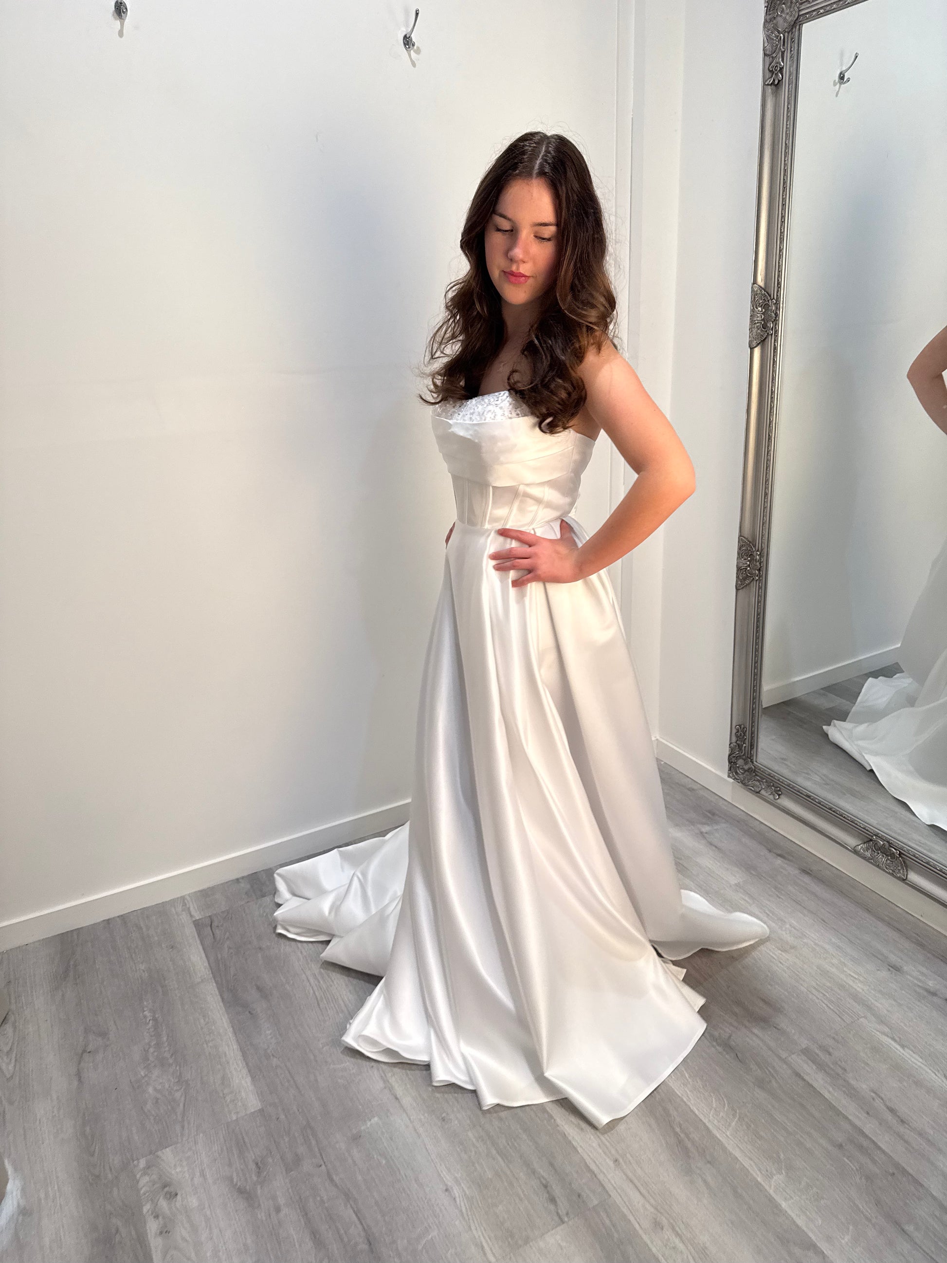 Elegant white Celestia debutante gown for Melbourne 2025 with structured bodice and soft tulle design.