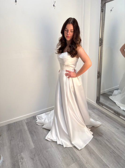 Elegant white Celestia debutante gown for Melbourne 2025 with structured bodice and soft tulle design.