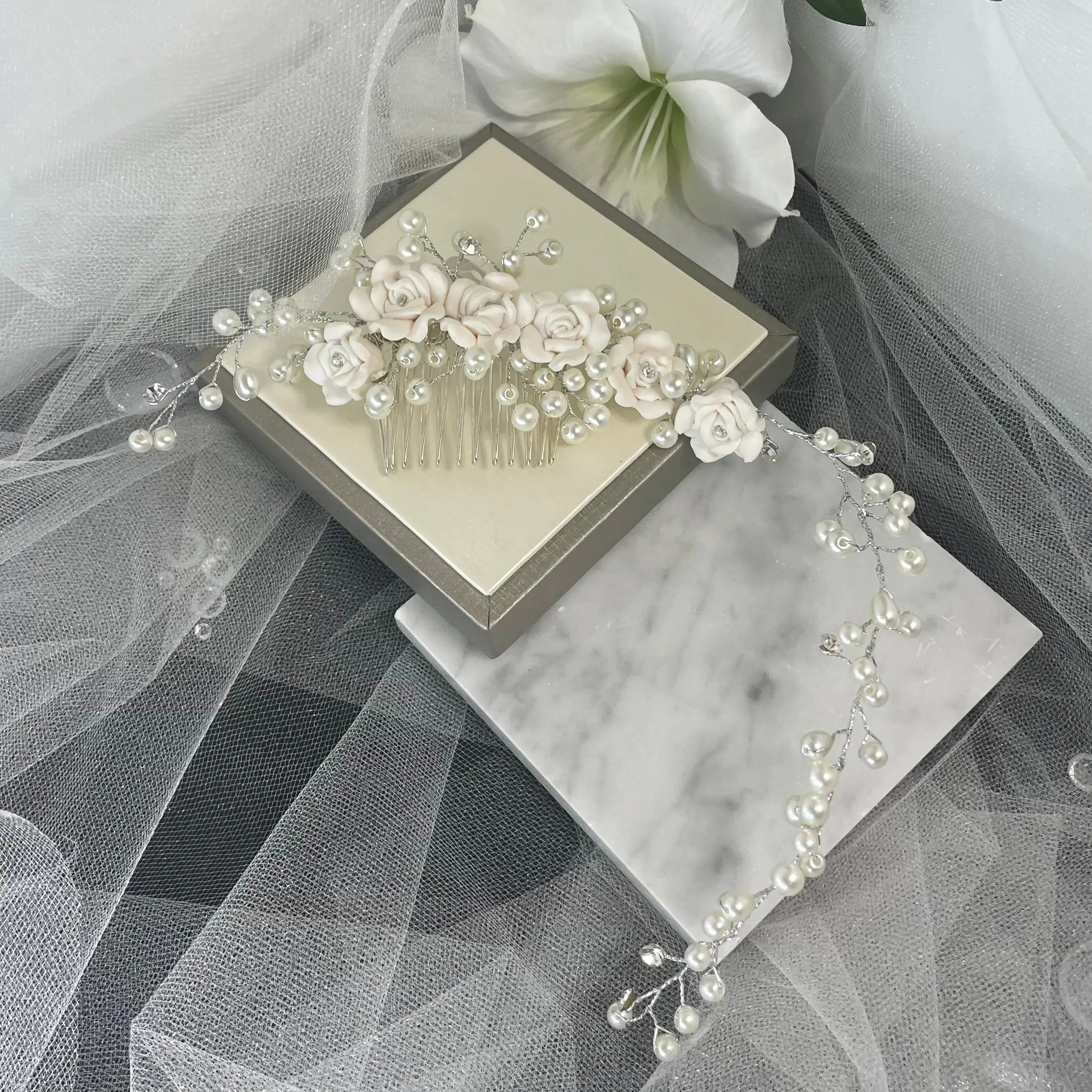 Clara Hair Vine by Divine Bridal: Elegant Flower Arrangement with Pearl Design.