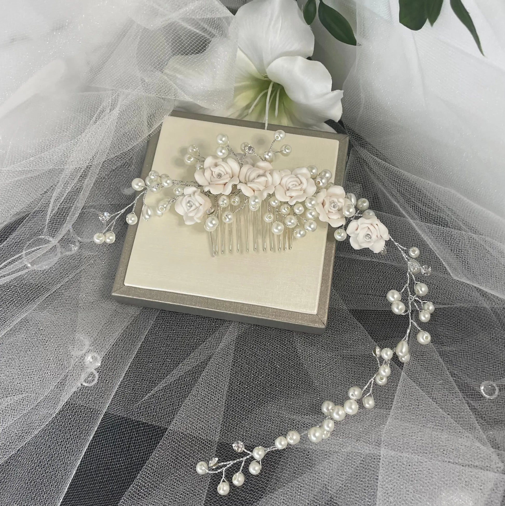 Clara Hair Vine by Divine Bridal: Elegant Flower Arrangement with Pearl Design.