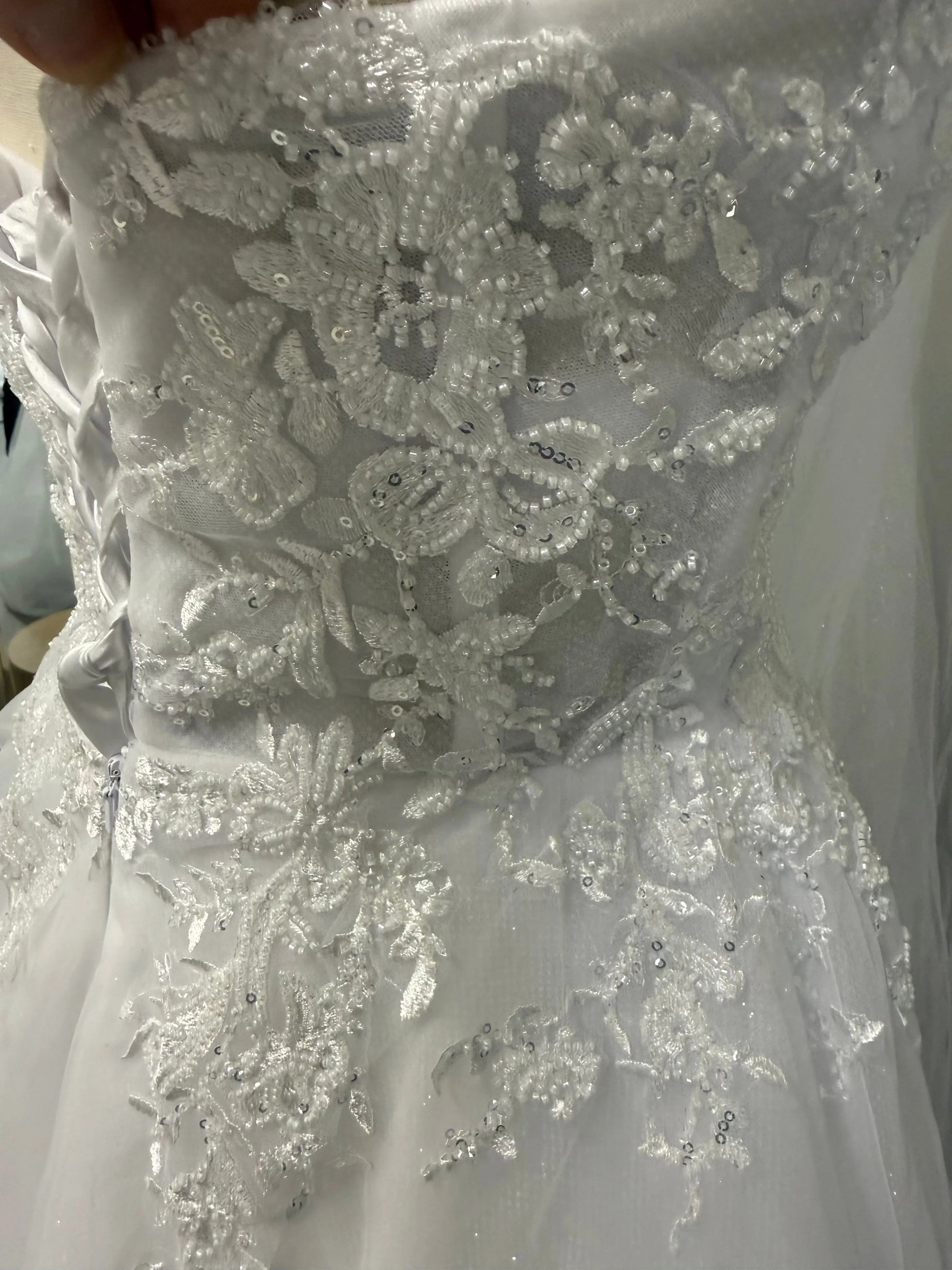 Claudia debutante dress lace detail – beaded floral appliqué close-up