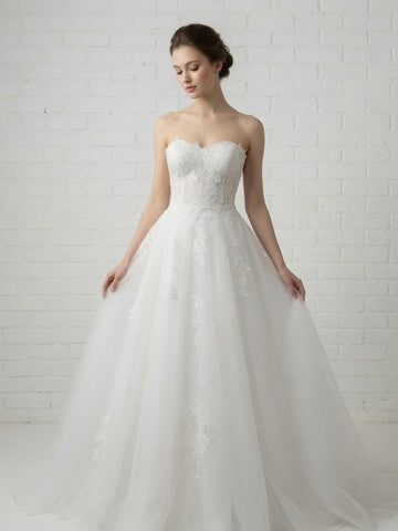 Coco Floral Lace Strapless White Debutante Ball Gown front view - intricate floral lace corset bodice and full tulle skirt