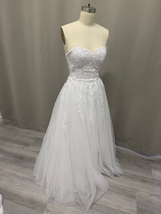 Coco Floral Lace Strapless Debutante Ball Gown on mannequin - elegant lace bodice with full tulle skirt