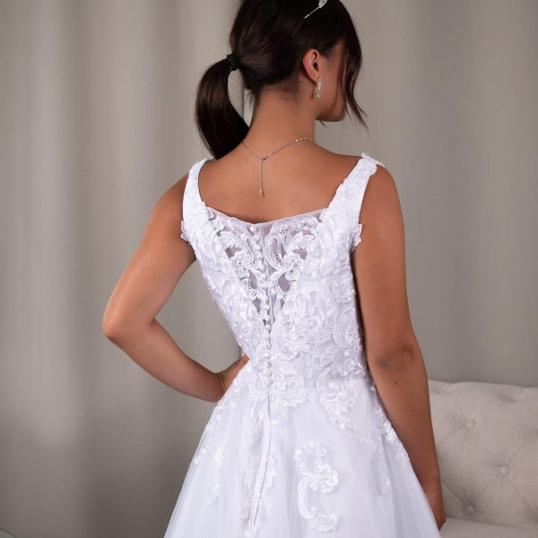 Back view of White Miranda Debutante Dress featuring Elegant V-Drop Lace Detailing.