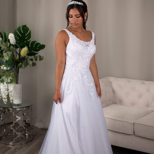 Miranda A-line Debutante Dress in White with Lace V-Neckline and Tulle Skirt.