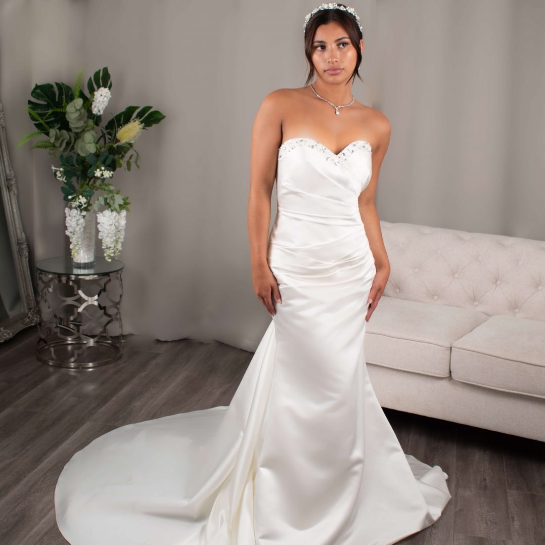 Colette's satin mermaid wedding dress with a sparkling sweetheart neckline.
