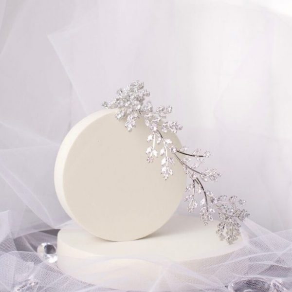 Elegant Nya CZ Leaf Bridal Tiara, adorned with sparkling solitaire stones and a crystal vine leaf design in silver, perfect for enhancing bridal elegance.