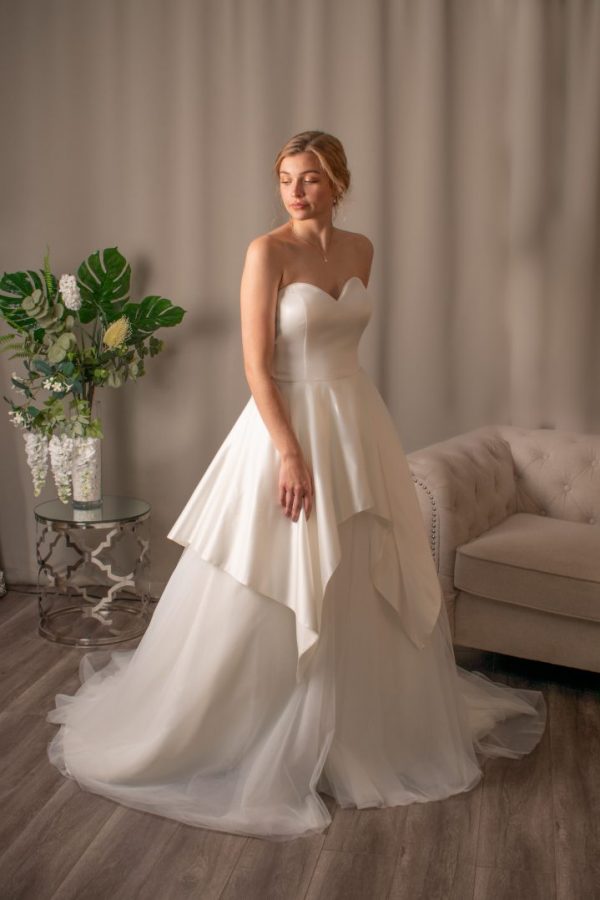 Everlee satin tulle ballgown with sweetheart neckline and scalloped overskirt.