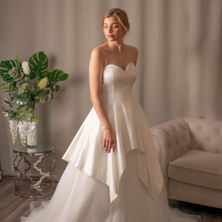 Everlee satin tulle ballgown wedding dress with sweetheart neckline and scalloped overskirt.