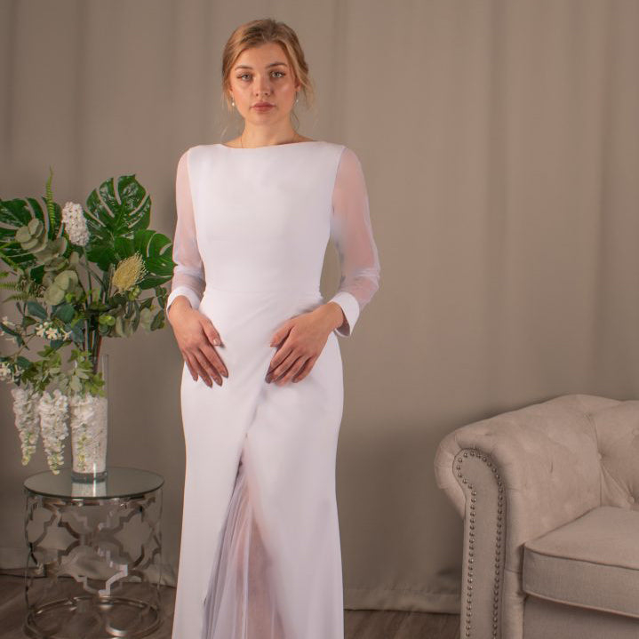 Bride in Ella's Illusion Neckline Tulle Wedding Dress, a blend of modern design and custom details.