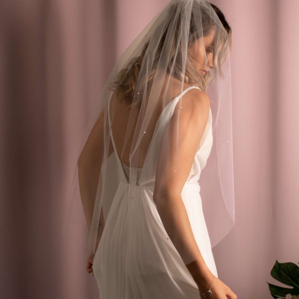Elegant Cibrina Diamanté Wedding Veil in soft US tulle, embellished with 4mm wide diamantés, offering a subtle sparkle and sophistication.