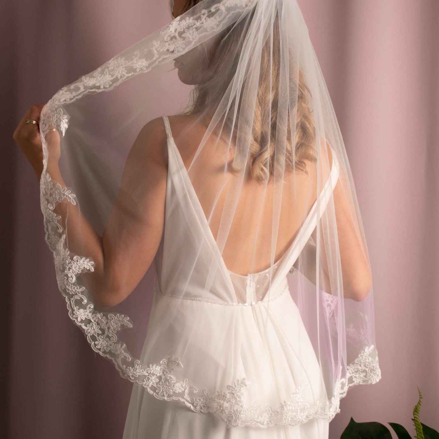 Elegant Layla Corded Lace Veil featuring soft tulle and delicate corded lace detailing, creating a sophisticated bridal look.