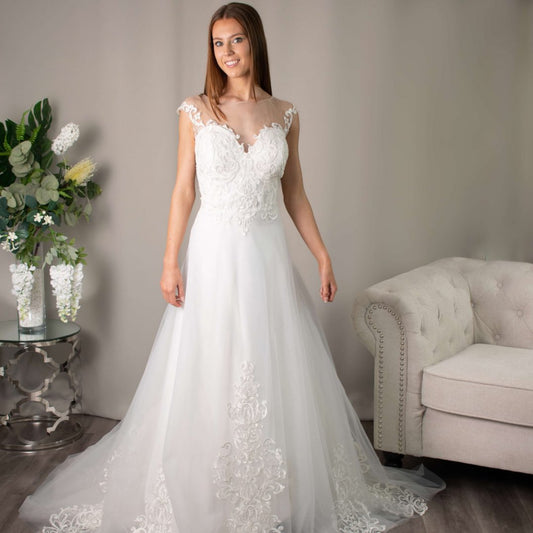Kayce Lace Wedding Gown - High-neck lace bodice with silver bead detailing and flowing georgette skirt.