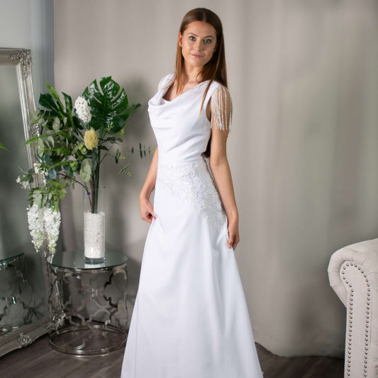 Camila beaded lace A-line bridal gown with cowl neckline by Divine Bridal.