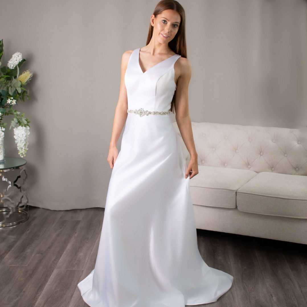 Edith deb dress with v-neckline and beaded back detail