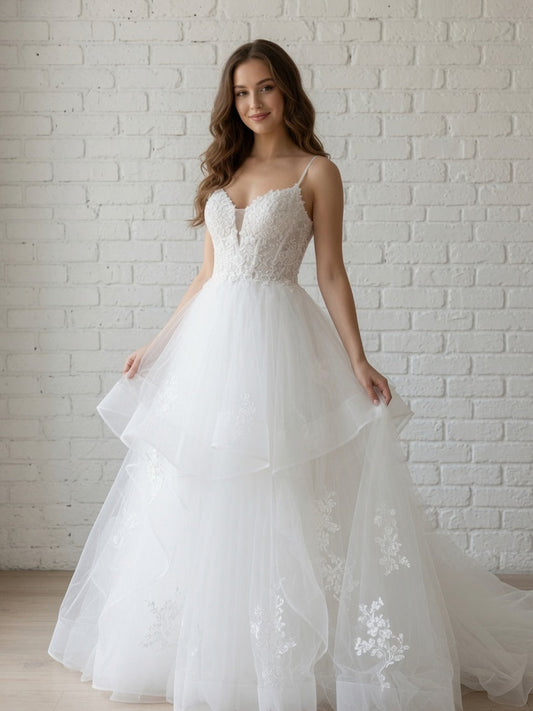 White debutante gown with lace bodice, illusion V neckline and layered tulle skirt 