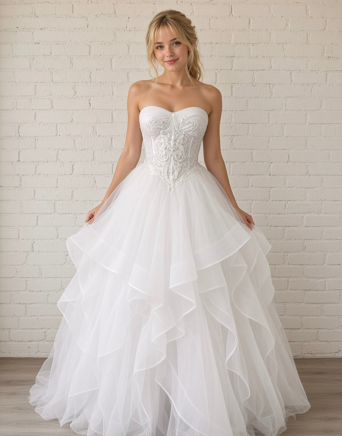 Deanna white strapless debutante ball dress, front view on Model with embroidered corset and layered tulle skirt