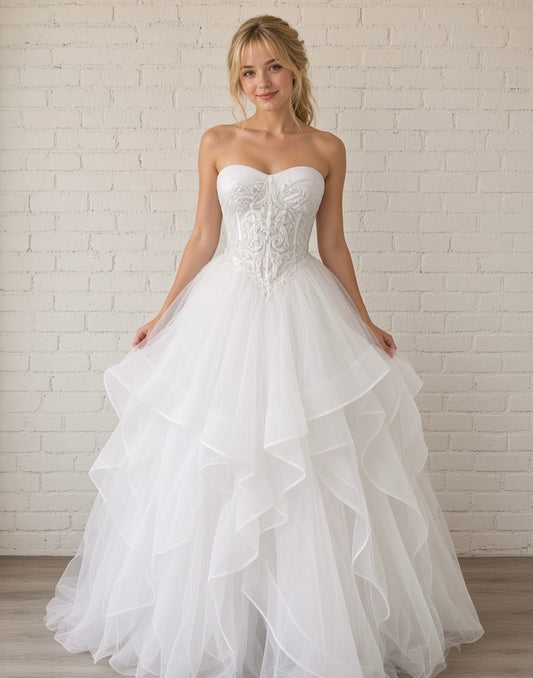 Deanna white strapless debutante ball dress, front view on Model with embroidered corset and layered tulle skirt