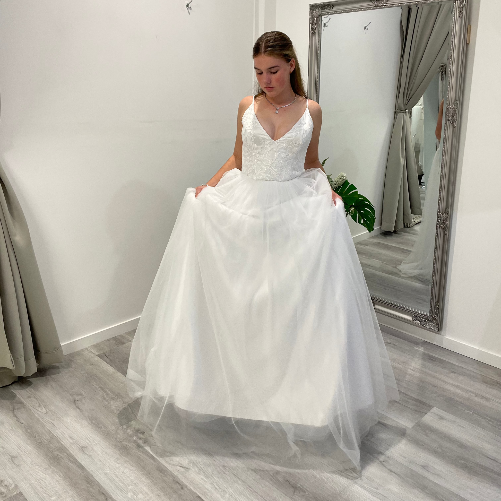 Front view of Valentina Lace Essence Deb Dress with a lace corset bodice, sweetheart neckline, and soft, flowing skirt, perfect for a timeless debutante look.