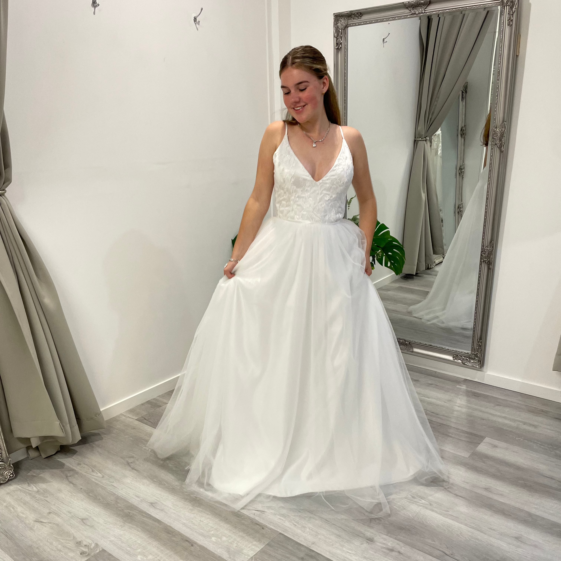 Front view of Valentina Lace Essence Deb Dress featuring a stunning lace corset bodice with intricate detailing, paired with a flowing skirt that adds grace and charm.