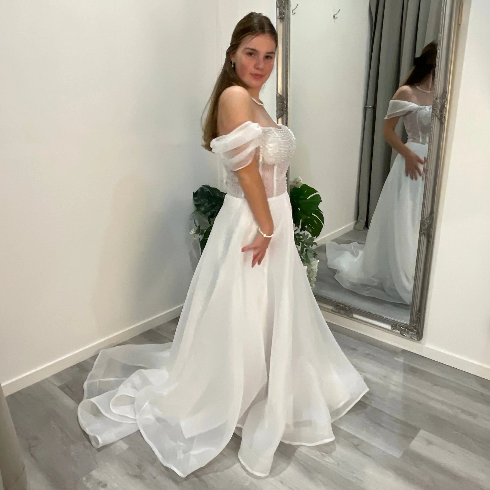 Elegant front view of Diana Debutante Dress with a lace corset bodice and scoop neckline, featuring an airy A-line organza skirt that flows gracefully from the waist.