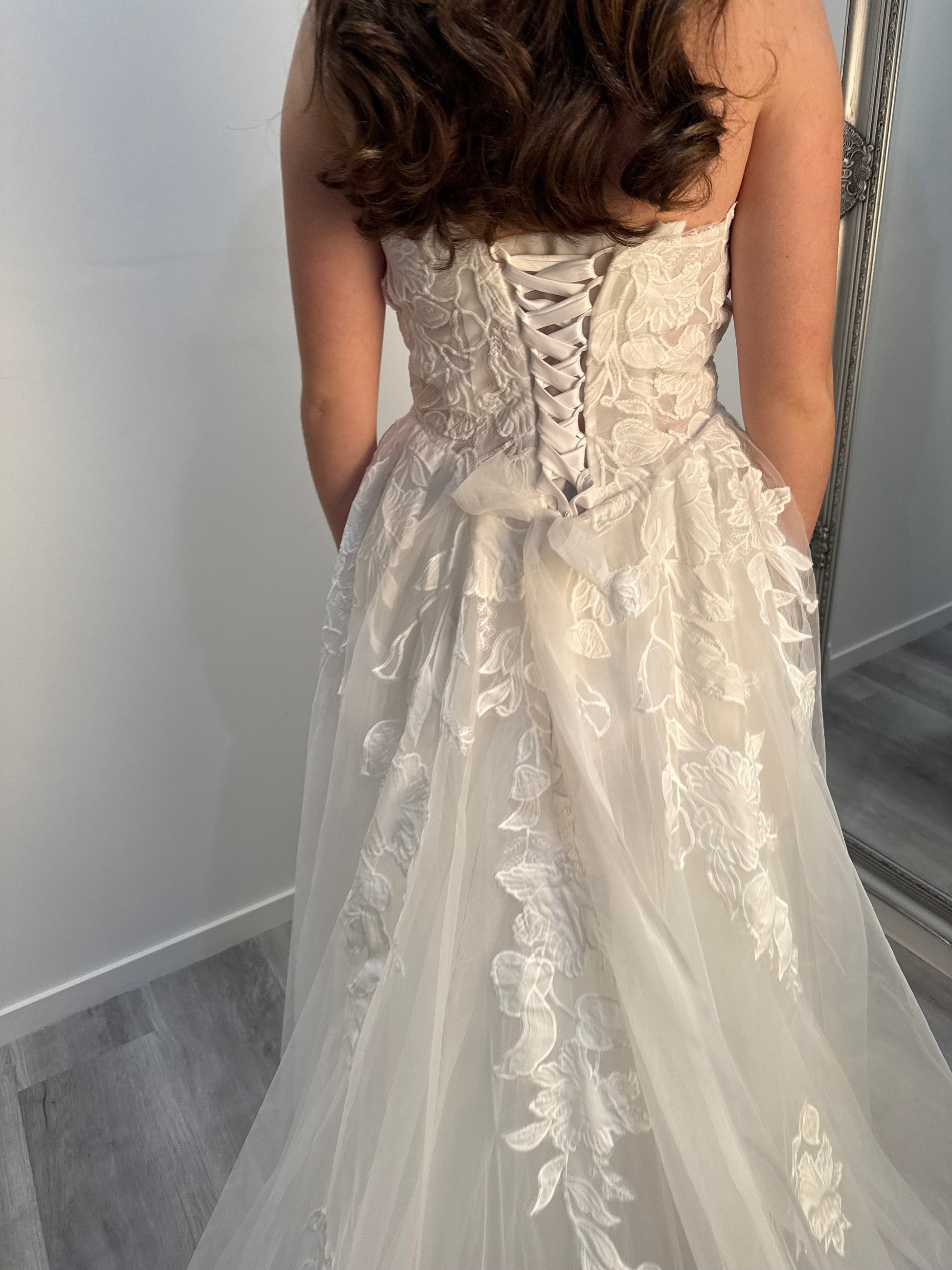 Back view of Dua Wedding Gown featuring lace-up closure and layered tulle skirt – Melbourne bridal collection.