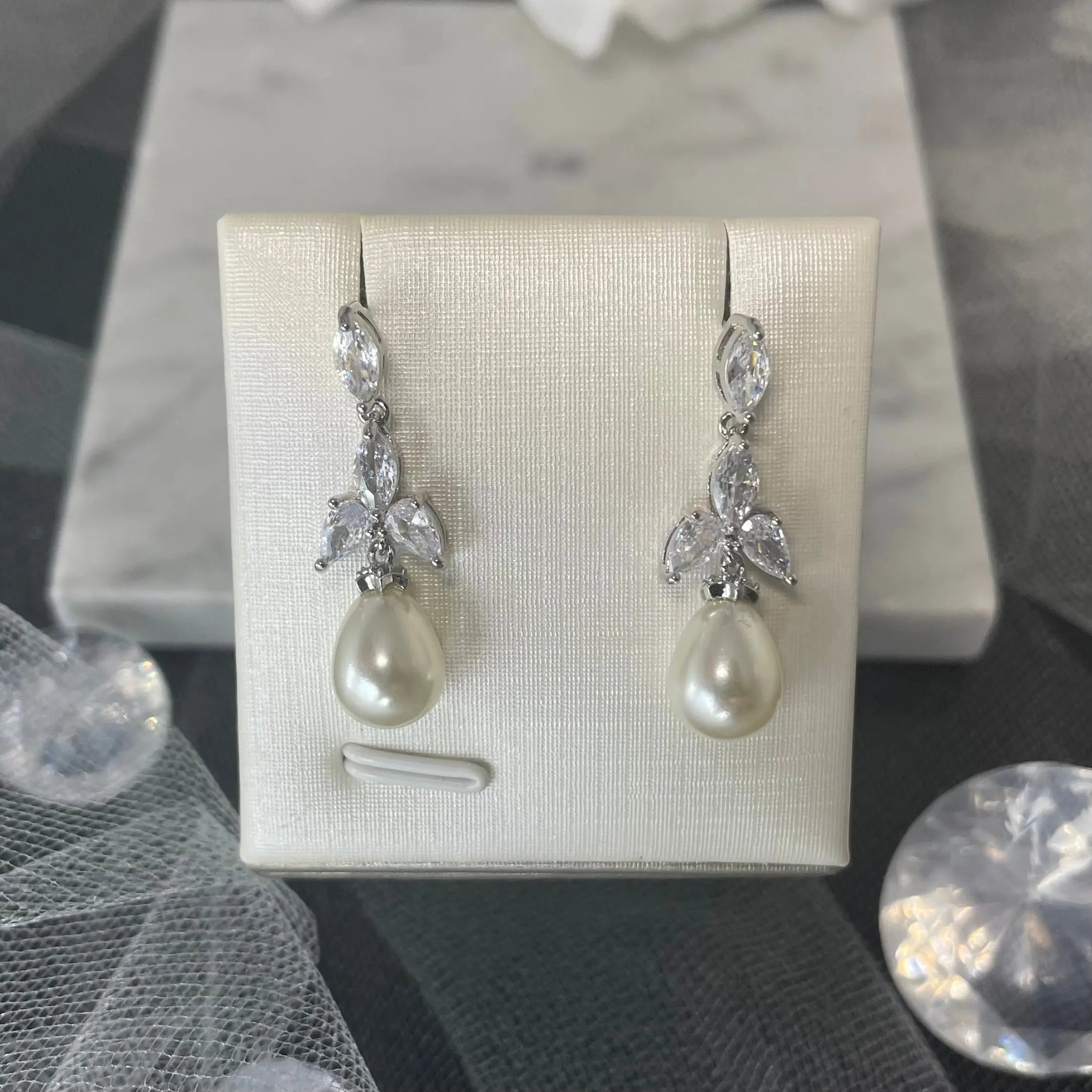 Ellet Silver Pearl Drop Earrings with CZ Cluster | Divine Bridal.