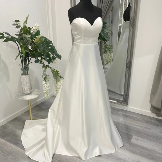 Opal Satin A-Line Wedding Dress showcasing elegance and simplicity at Divine Bridal.