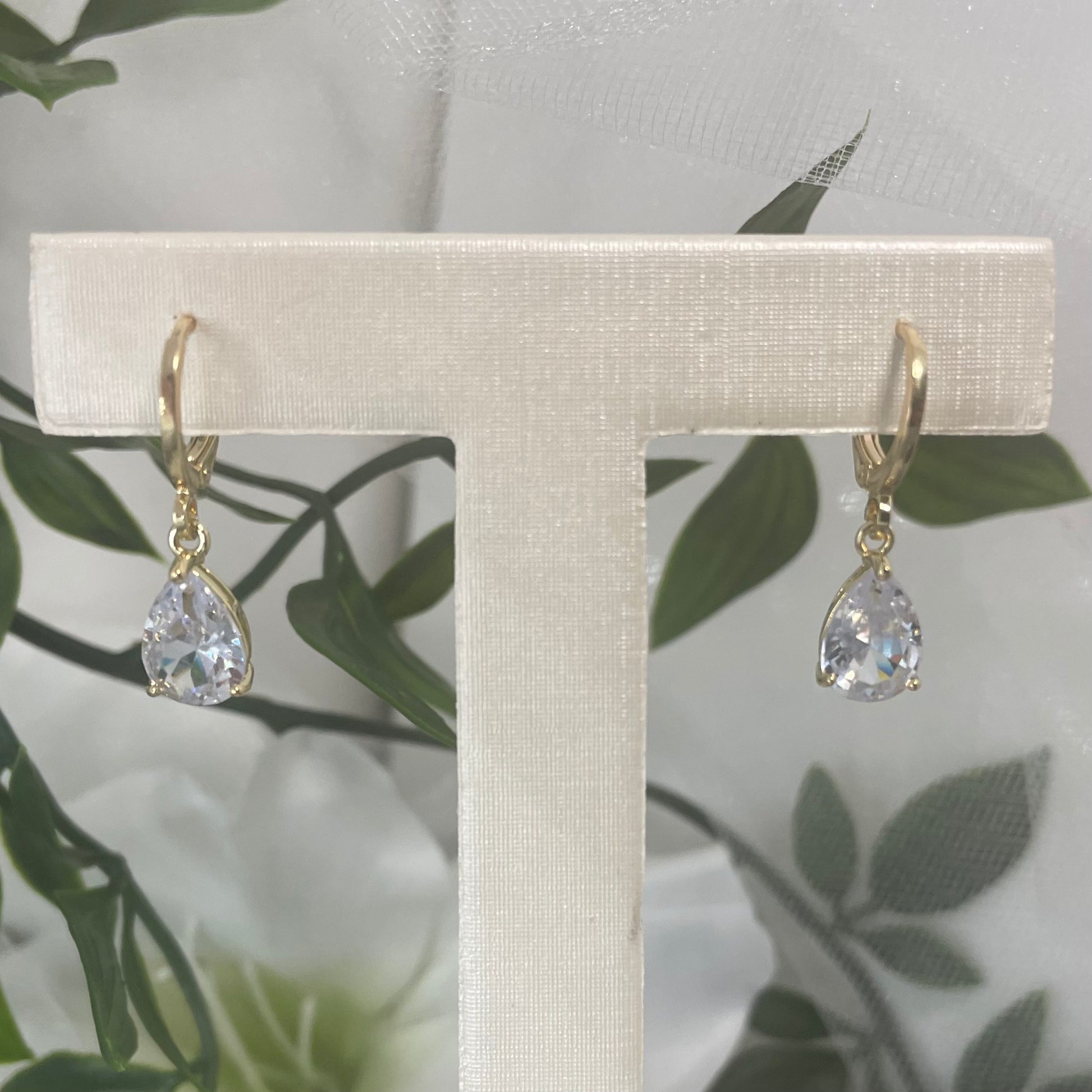 Sabrina Gold Wedding Earrings featuring a dangle hoop design with a cubic zirconia teardrop.