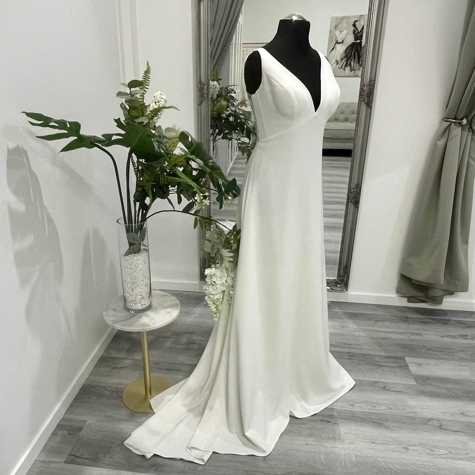Isolde Wedding Dress - A minimalist design with elegant silhouette on display at Divine Bridal.