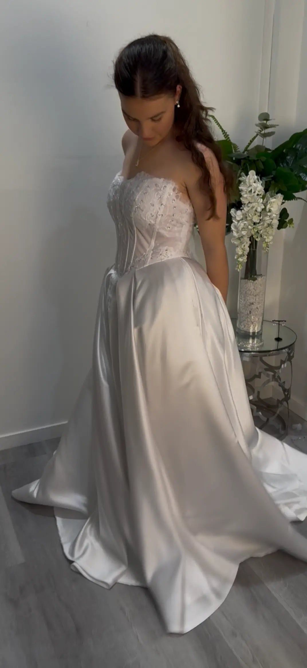 Girl standing to the side showing off dress